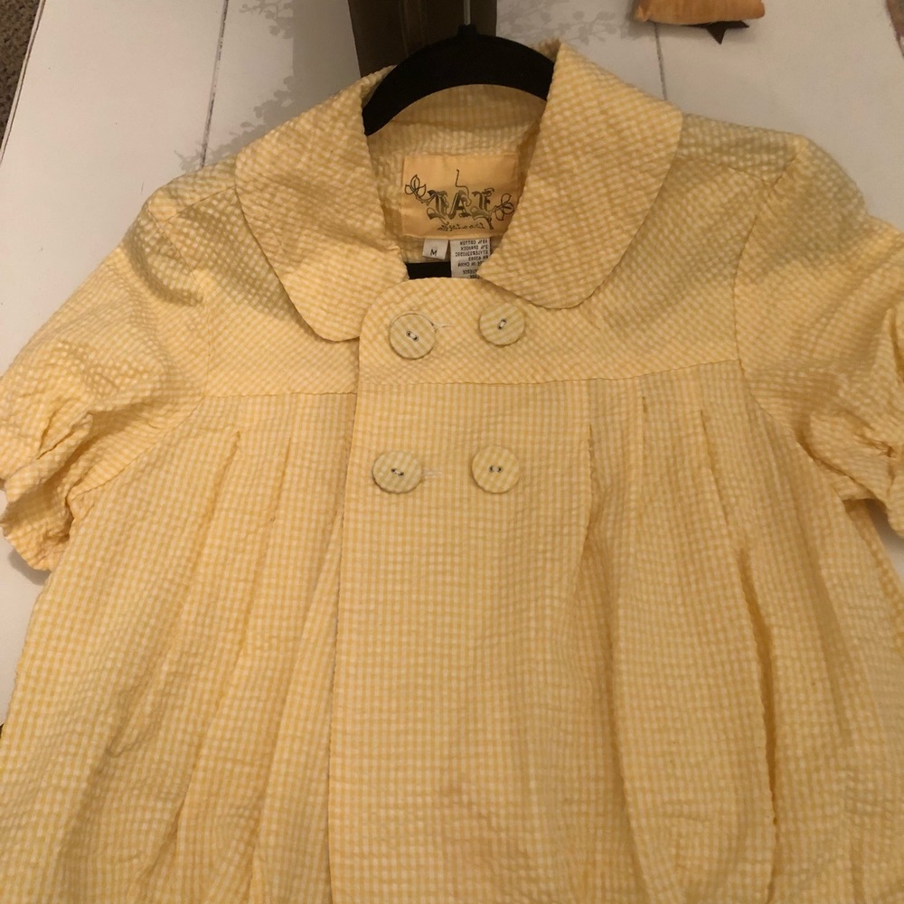 New without tags/yellow & white double breasted summer jacket.